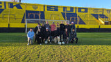 The group after taking some penalty kicks against the club's goalkeeper