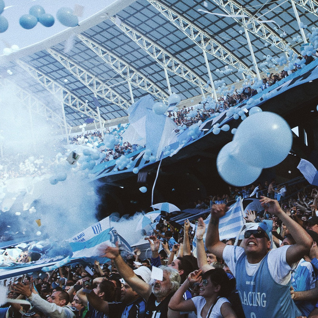 Fans inside stadium in argentina watching a football match