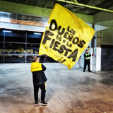 Peñarol fans chanting and waving black and yellow flags