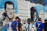 fans visiting mural football argentina