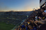 Night match atmosphere at La Bombonera with Boca Juniors fans