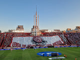 Large telón banner on display under the art-deco pillar of Club Atlético Huracán's Tomás Adolfo Ducó stadium